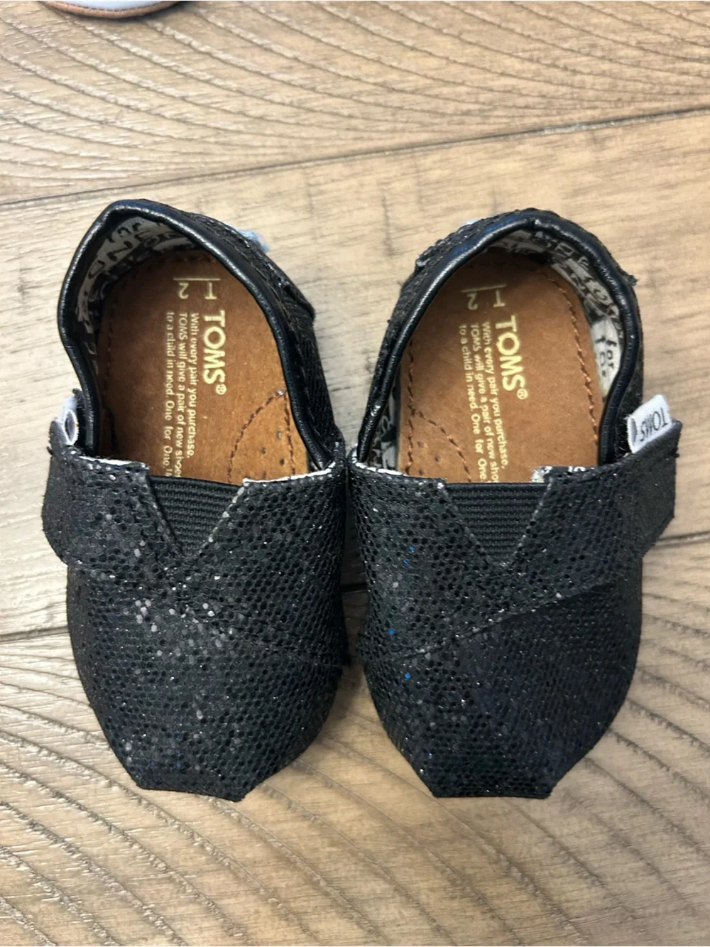 Size 2 Toddler girl TOMS Black Glitter Slip-On Shoes